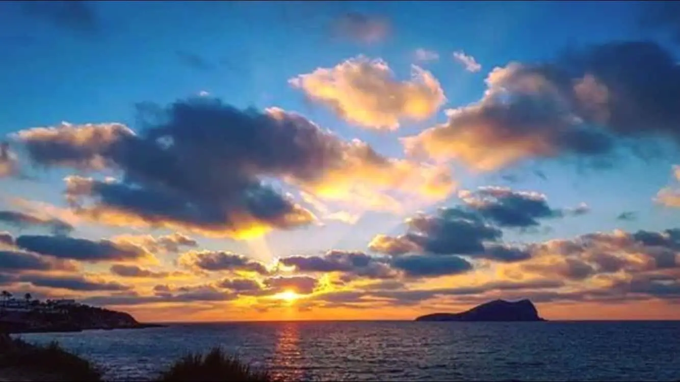 Ibiza Winter sunset sea view with clouds in the sky